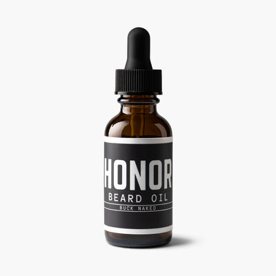 Buck naked unscented beard oil on white background with light shadow