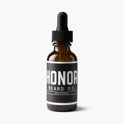 Honor's defender scented beard oil with a white backdrop