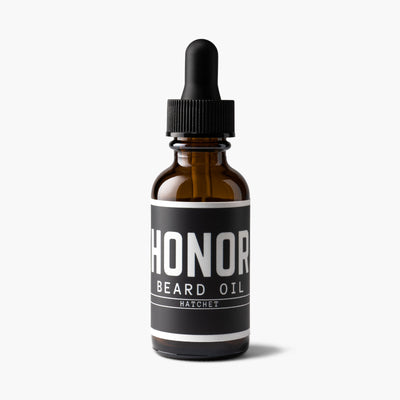 Honor's lightweight beard oil in the Hatchet blend sitting on a white backdrop